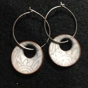 White etched enameled earrings